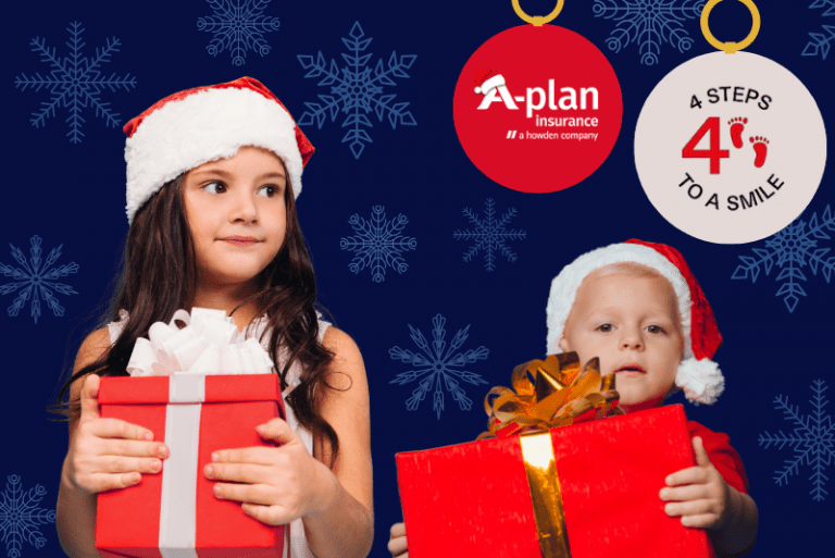 Children with Christmas gifts -A-Plan supports 4 Steps To A Smile
